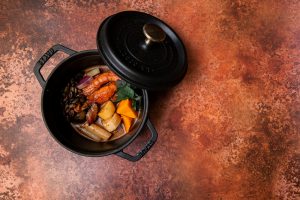black cooking pan with food