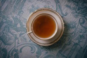 a cup of tea sitting on top of a table